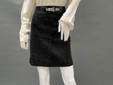 an image of a mannequin wearing a skirt and blouse