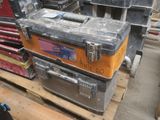 many different types of tool boxes stacked on a pallet