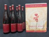 un lot de six bouteilles de bière posées sur une table