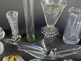 a lot of glass items that are on the table