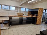 a kitchen with a lot of counter space in the middle of the room