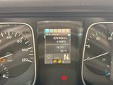 a close up of the dashboard of a car with various gauges and numbers