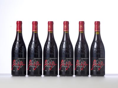 six bottles of red wine lined up in a row