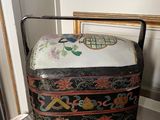 a black and white box sitting on top of a table