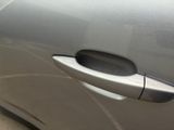 a close up of a door handle on a car