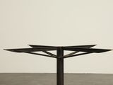 an image of a black table with two plates on top of it