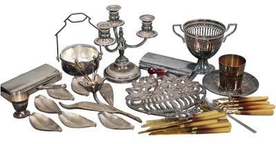 a lot of silver items that are on the table