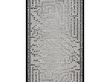 a black and white rug with a pattern on it