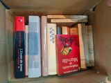 a box full of books that are sitting on a table
