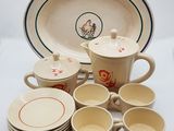 a lot of cups and saucers on the table