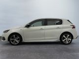 a picture of a white car parked in a parking lot