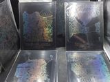 trois livres sont posés sur une table dans une voiture