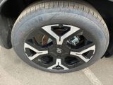 a close up view of a tire on a car