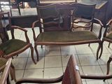 a room with a lot of chairs and tables in it