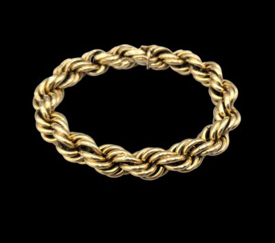 Bracelet en or jaune 750 °° à mailles torsadées.