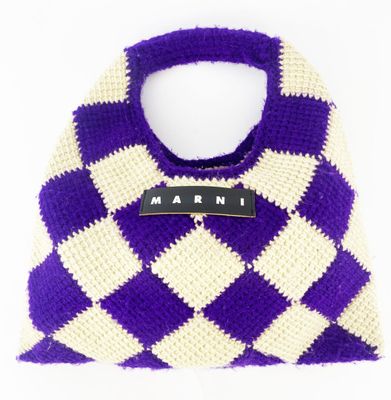 purple and white crocheted bag with a name tag on it