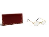 sunglasses in a box and a pair of glasses on a white background