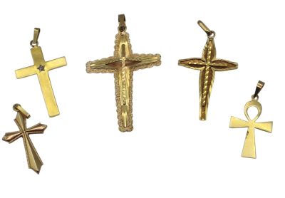 trois croix dorées et un ankh sur fond blanc