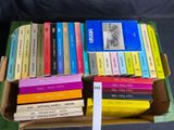a lot of books in a box on the table