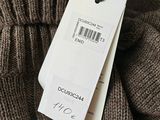 a label on a sweater that says,,,,,,,,,,,,,,,,,,,,,,,