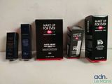 three boxes of make up for ever products sitting next to each other