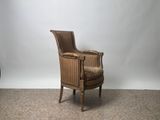 an image of a chair sitting in front of a white backdrop