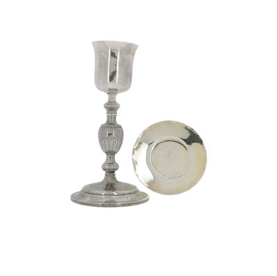 silver plated candle holder with a silver plate and a silver plate
