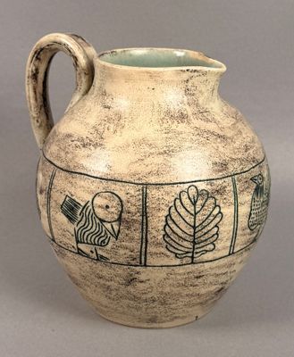 a vase with a design on it on a table