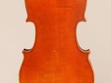 an old violin with a wooden back and bow on a white background