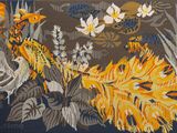 a picture of a rug with a bird and flowers on it