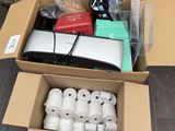 a cardboard box with a bunch of items inside of it