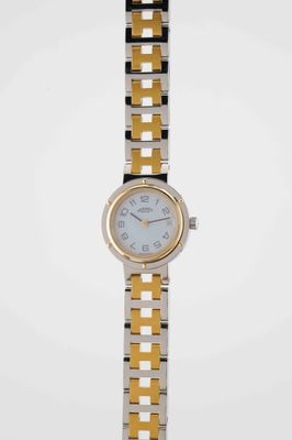 an image of a woman ' s wrist watch on a white background