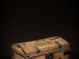 a small wooden box sitting on top of a table