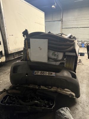 an image of a truck that is in a garage