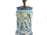 a blue and white vase with a horse on it