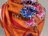 a close up of a scarf on a mannequin head on a mannequin head