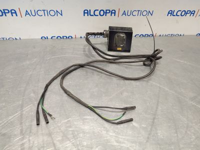 a picture of a car radio wiring harness with wires attached to it