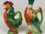 pair of ceramic figurines of a rooster and a rooster