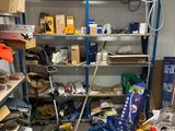 a room filled with lots of clutter and tools
