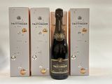 two bottles of tattingerer and two boxes of champagne