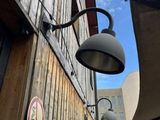 a street light that is on the side of a building