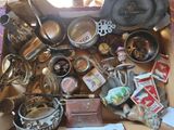 a box full of old kitchen items on a table