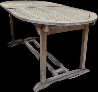 a wooden table with a wooden top on a black background