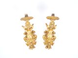 pair of antique gold candlesticks with cherenshes and cherenshes on them