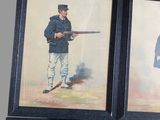 three framed pictures of men in uniforms and hats holding rifles