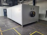 a large machine that is sitting inside of a building