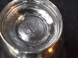 a close up of a glass of water on a table