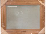 an old picture frame with a drawing of a smiley face on it