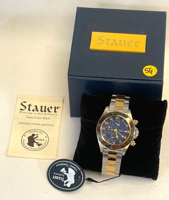 a watch that is sitting in a box on a table