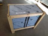 a wooden box that has some boxes on top of it